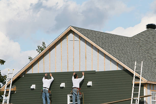 Professional Siding technician working in Sanford, VA